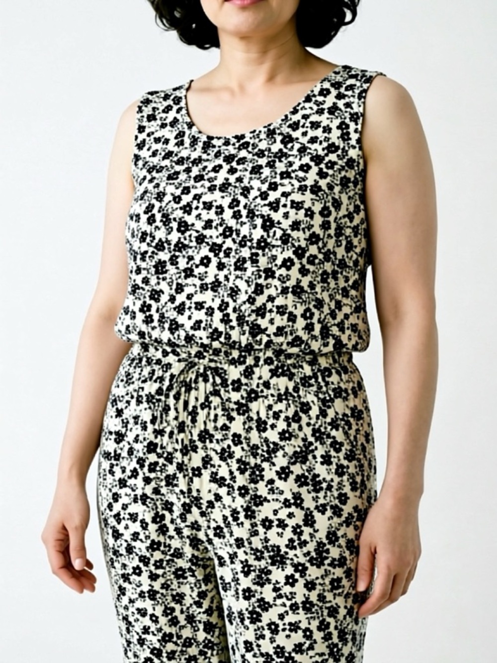 Sleeveless Cream Jumpsuit with Black Floral Print